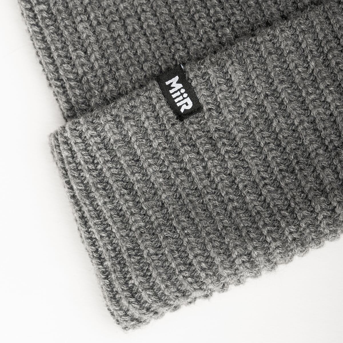 recycled-poly-rib-beanie-w2 WebPDP-RecycledPolyRibBeanie_Studio_TagDetail_GrayHeather__BNE002202OS.jpg
